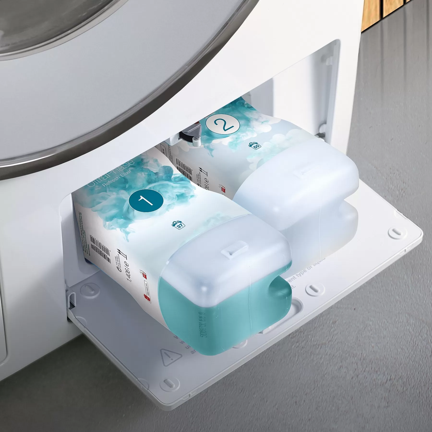 Miele Cura del Bucato: Ultraphase 1 e 2 - Elisir Rigenerante per Tessuti Freschi
