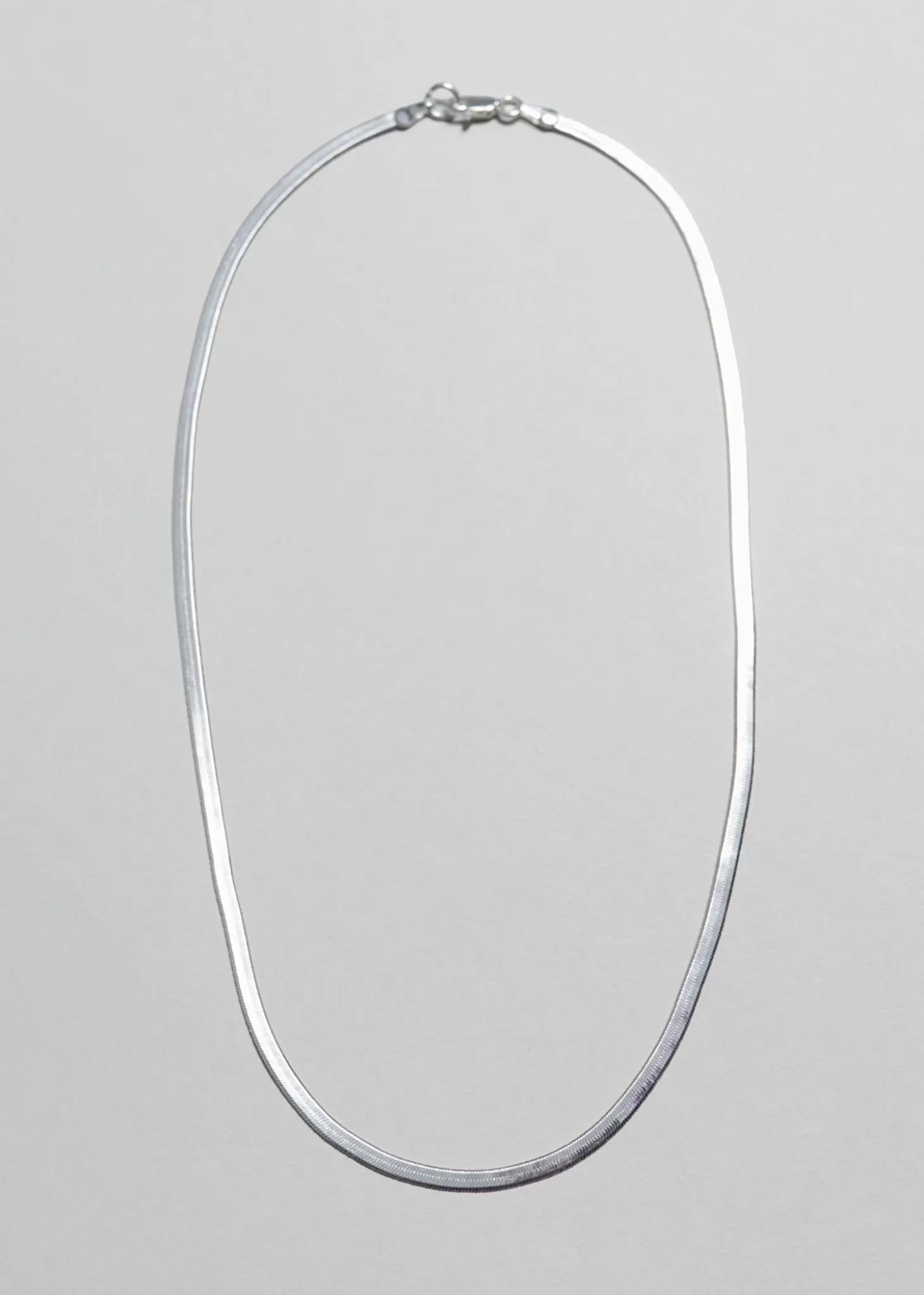 Collana Serpente Minimalista in Argento con Chiusura Sicura - Gioiello Elegante da Best & Stories